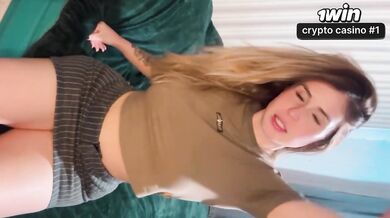 Blonde with a WET PUSSY shakes her bootie in a short miniskirt and crimson panti